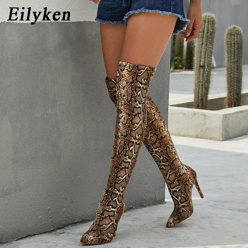 Fierce & Flawless: Leopard and Serpentine Thigh-High Boots