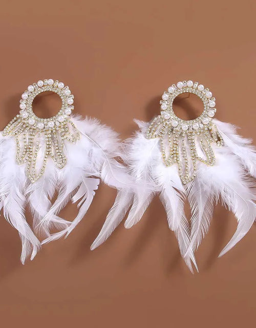 Load image into Gallery viewer, Charming Bohemian Feather Earrings – Luxury Crystal Bridal Statement Jewelry
