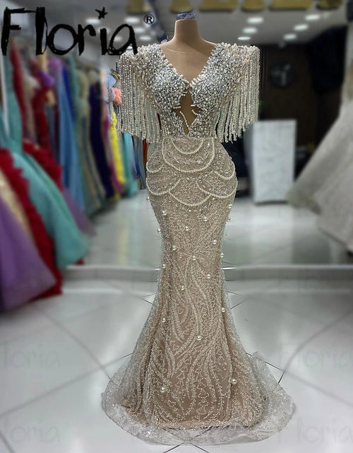 Load image into Gallery viewer, Ethereal Glam: Chic Nude Beige Beaded Tassel Mermaid Gown with Cape Sleeves
