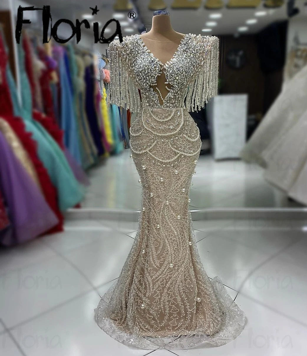 Ethereal Glam: Chic Nude Beige Beaded Tassel Mermaid Gown with Cape Sleeves