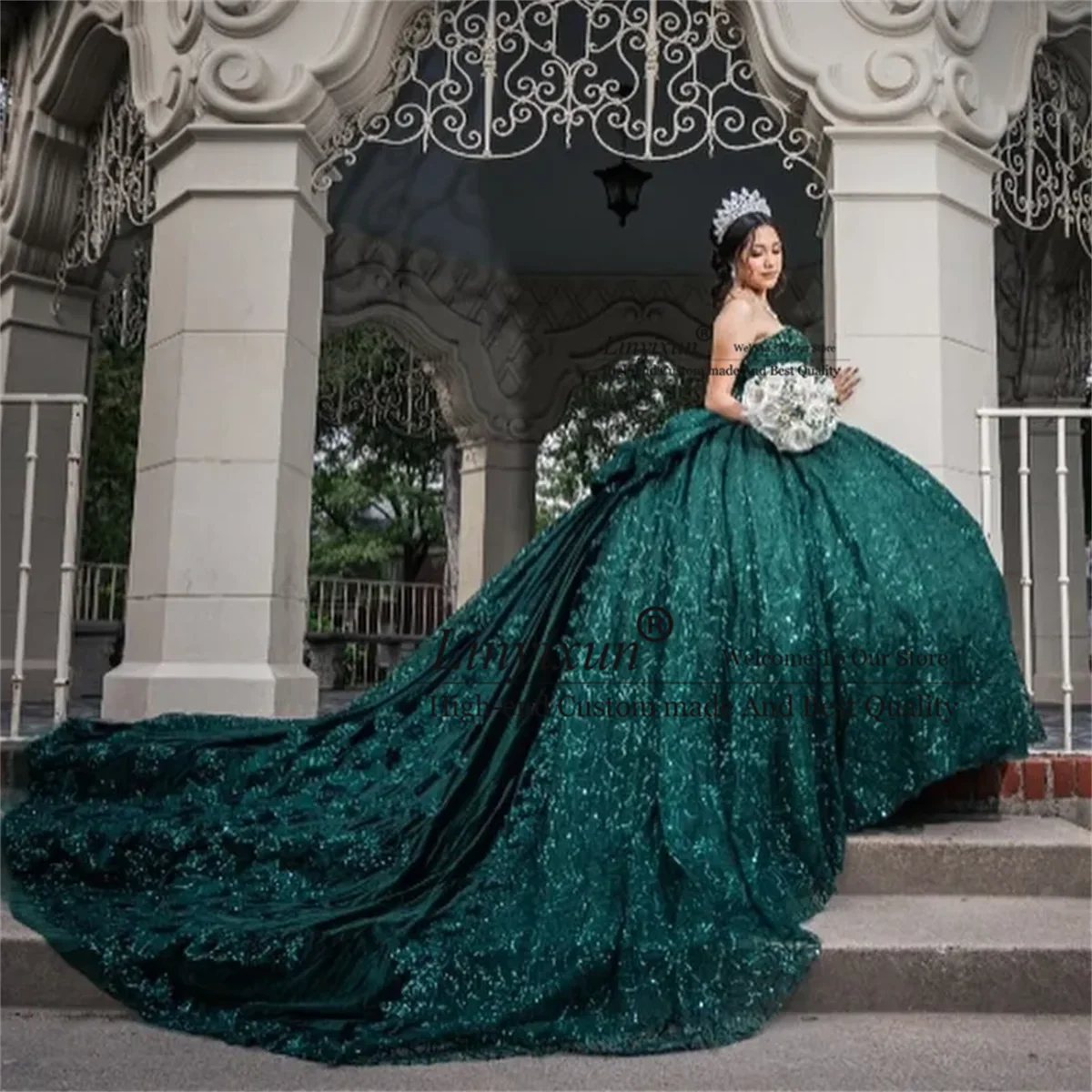 Emerald Enchantment: Luxury Green Lace Ball Gown with Bow and Beaded Appliques