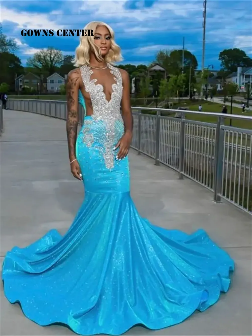 Ethereal Sparkle: Light Blue Long-Sleeve Rhinestone Prom Gown