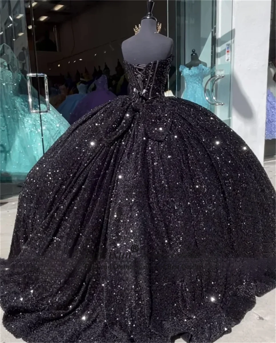 Sparkling Royalty: Glitter Ball Gown Quinceañera Dress with Bow and Sequins