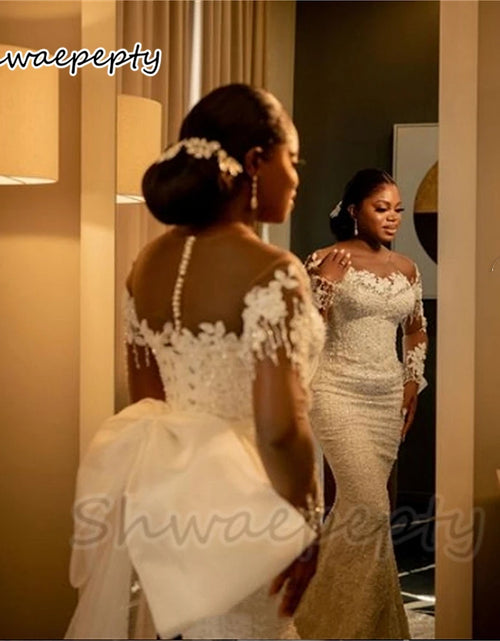 Load image into Gallery viewer, 2-in-1 Sequined Mermaid Wedding Dress – Detachable Skirt, Illusion Sleeves &amp; Bow Back African Bridal Gown
