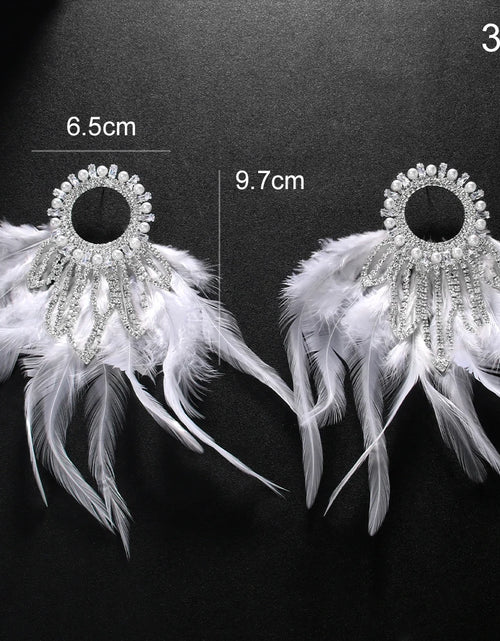 Load image into Gallery viewer, Charming Bohemian Feather Earrings – Luxury Crystal Bridal Statement Jewelry
