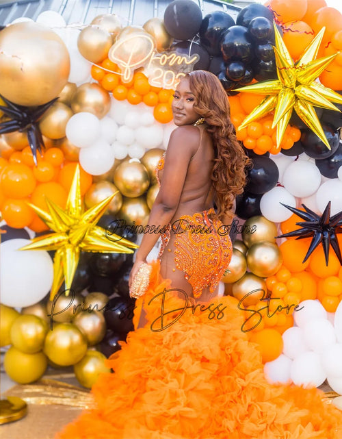 Load image into Gallery viewer, Fiery Glamour: Sparkly Orange Mermaid Gown with High Slit and Ruffles
